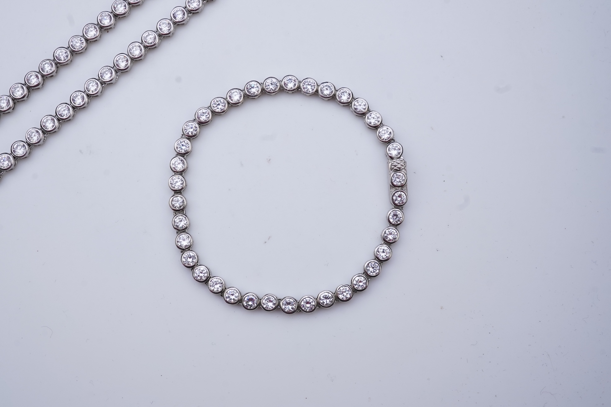 A cubic zirconia demi-parure